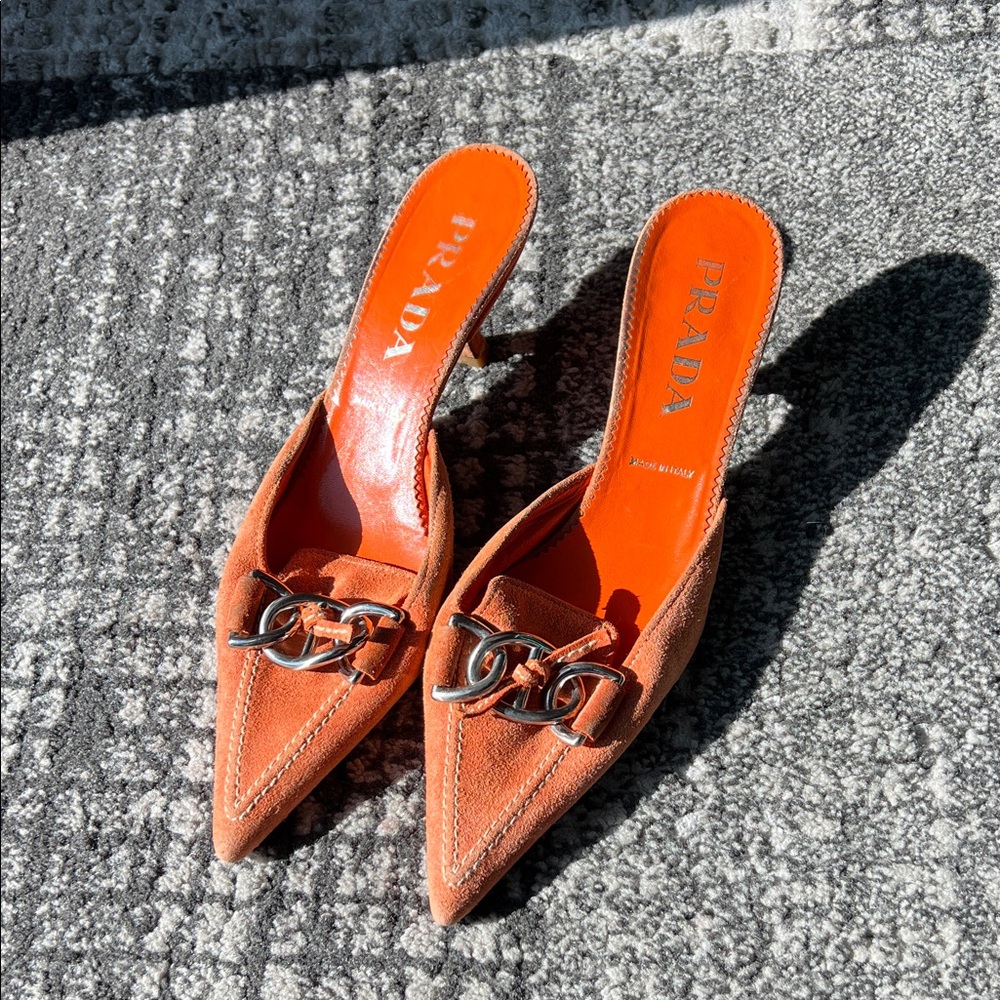 Orange Prada kitten heels